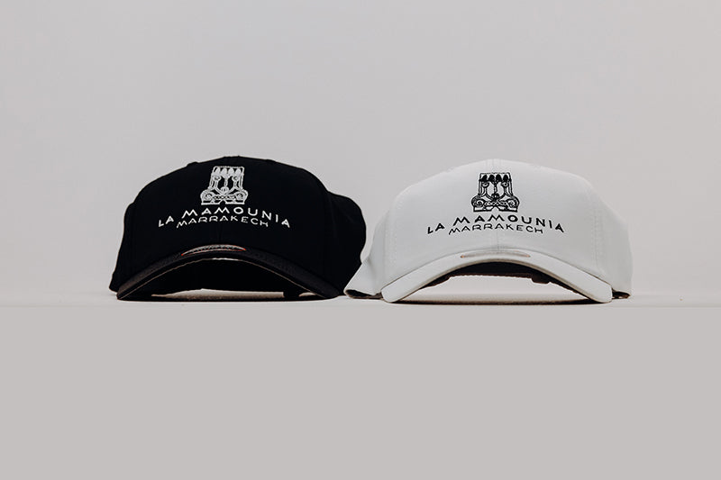 Gorras negras/blancas con logo mamounia