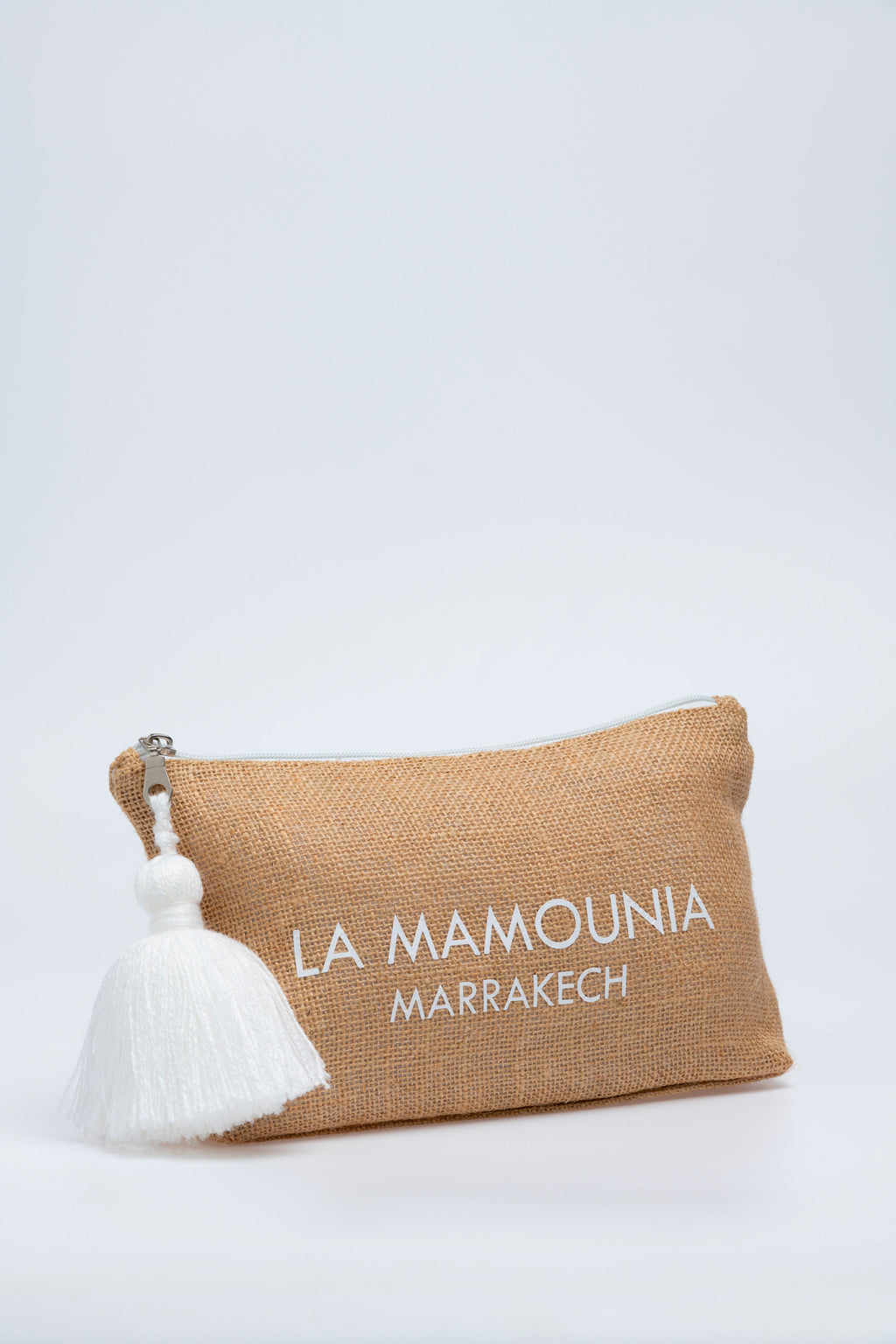 Trousse tissage tresse noir et orange avec pompon noir – La Mamounia