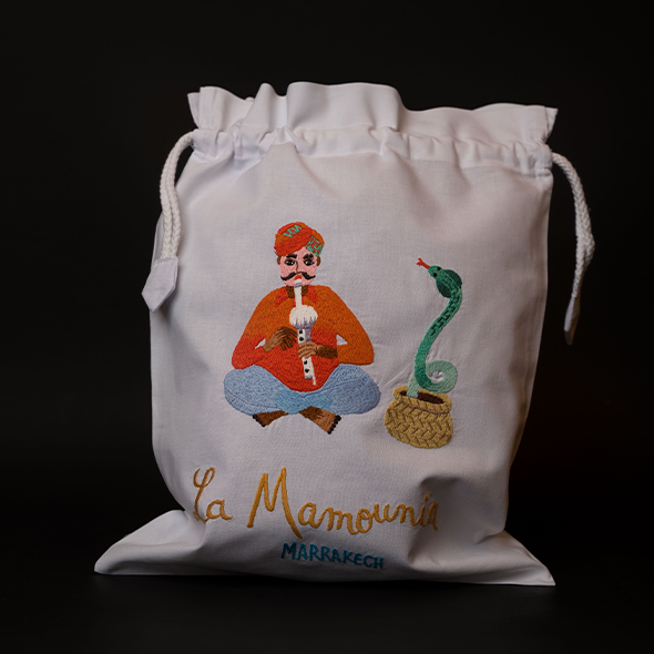 Snake Charmer embroidered cotton pouch