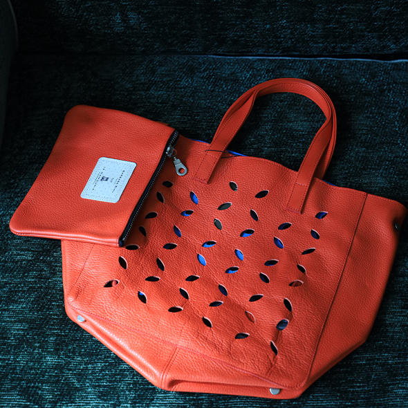 Perforated tote bag