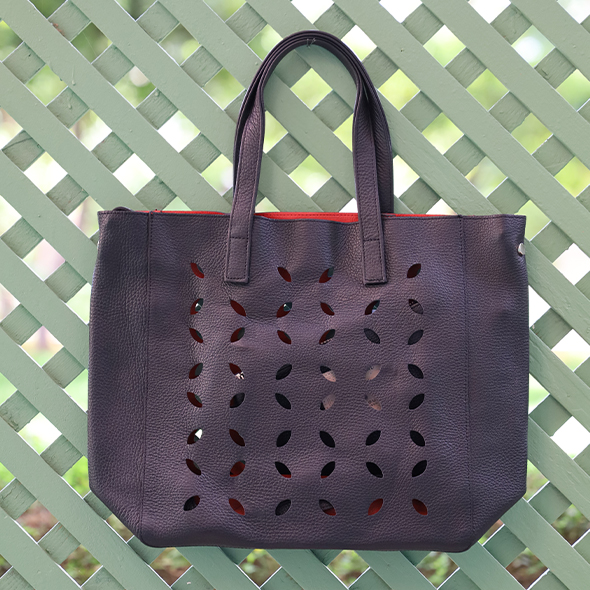 Perforated tote bag