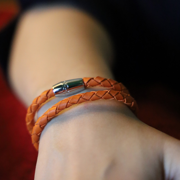 Women's orange lambskin braided mohican bracelet